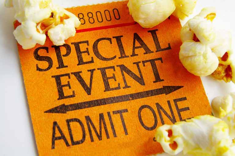 A “special event” ticket, with a few pieces of popcorn.